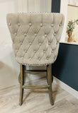 Roxy buttoned back bar stool