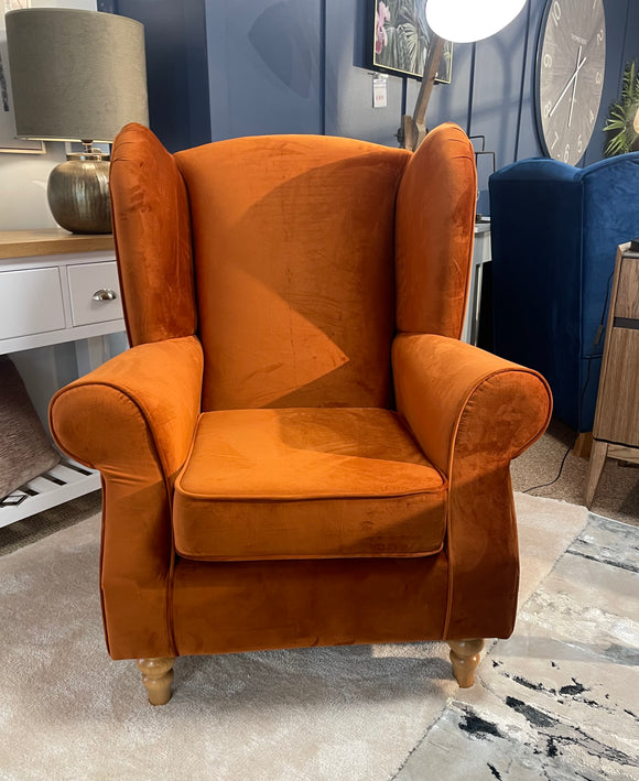 Orange velvet wingback online chair